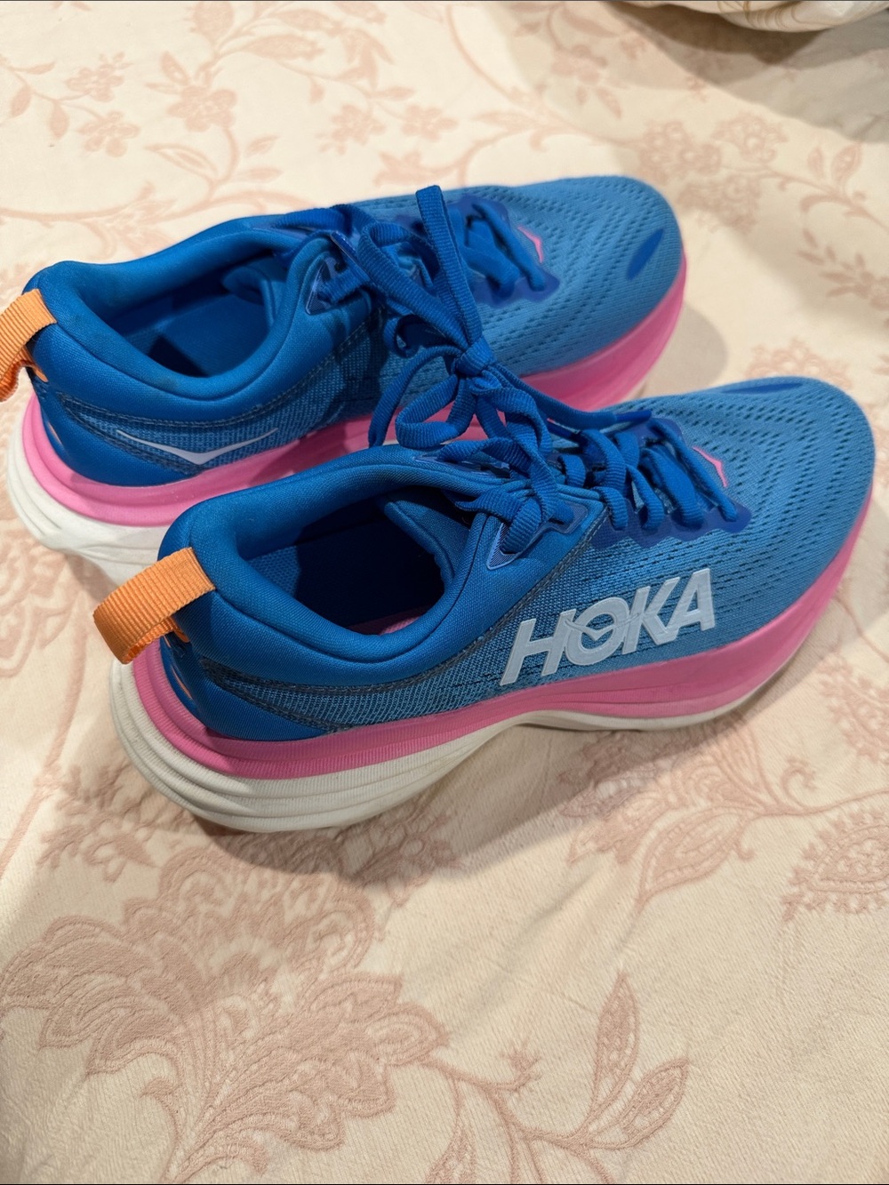 Hoka Women's Bright Blue Running Shoes with Pink Midsole and Orange Heel Tab